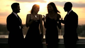 stock-footage-multi-ethnic-attractive-male-and-female-friends-drinking-toasting-at-luxury-outdoor-cocktail-party